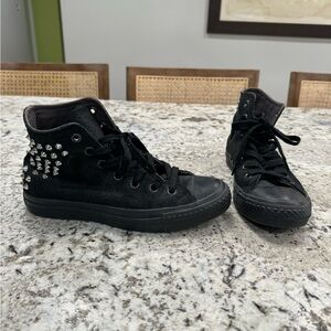 Converse size women’s 7. Black studded high top